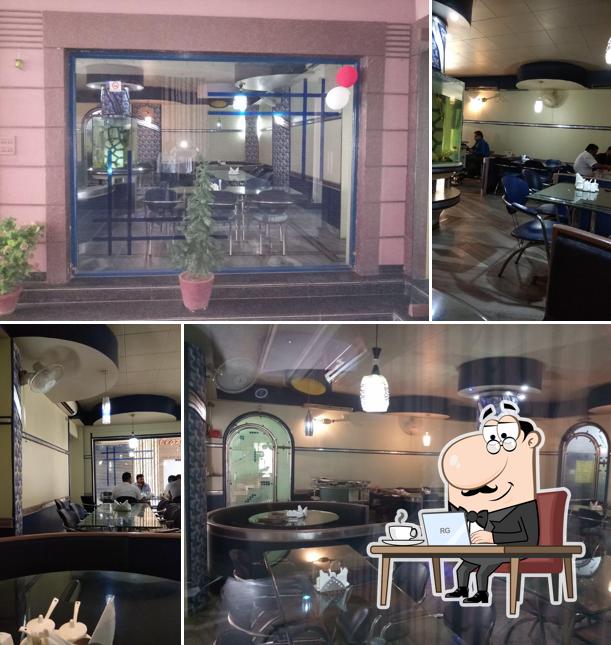 Take a seat at one of the tables at Oasis Restaurant