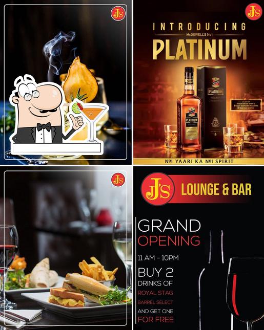 Get a drink at JJ'S Lounge & Bar