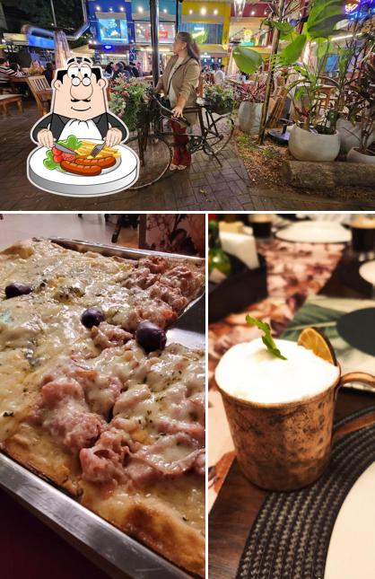 Entre diversos coisas, comida e exterior podem ser encontrados a Bendita Maria Pizzaria