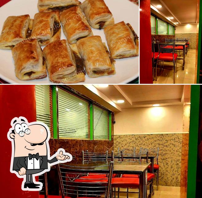 Check out the photo showing interior and dessert at Eleven star bakery