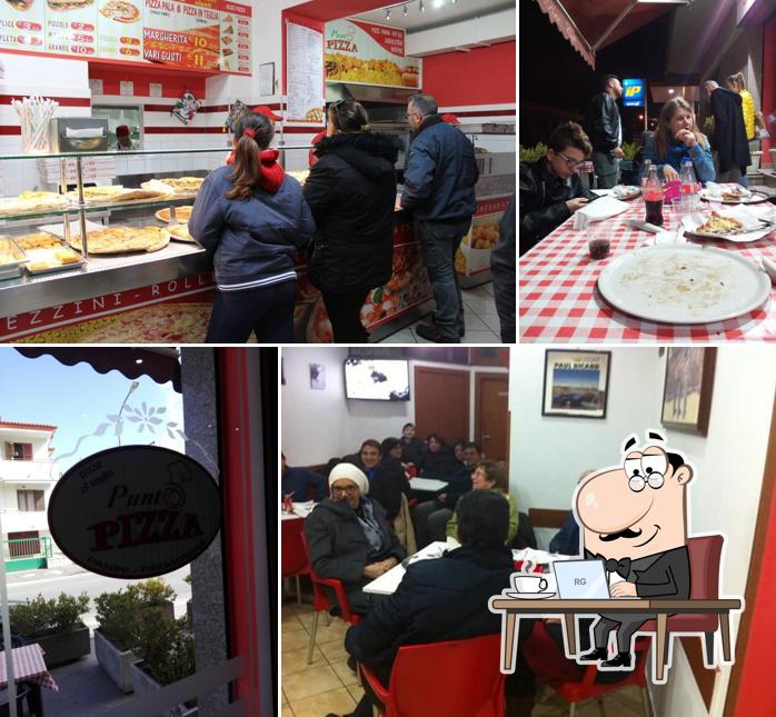 Dai un'occhiata agli interni di Punto Pizza