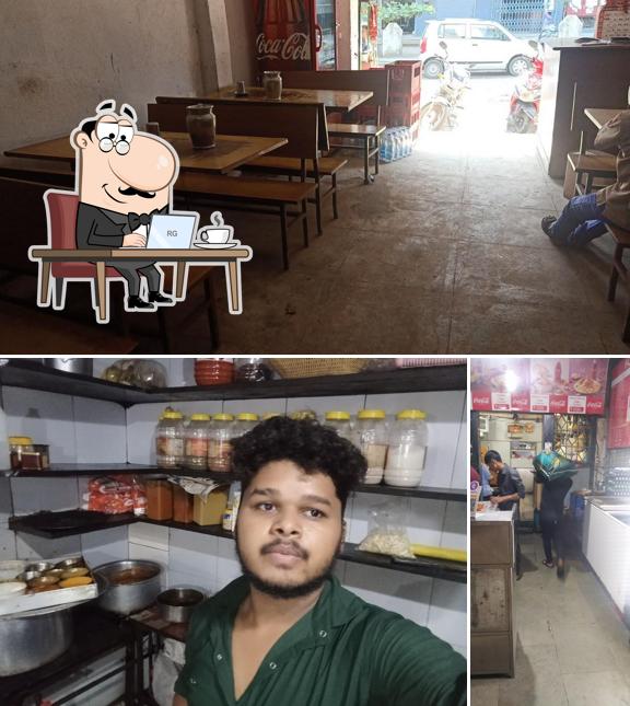 Take a seat at one of the tables at Hotel Shangeeni