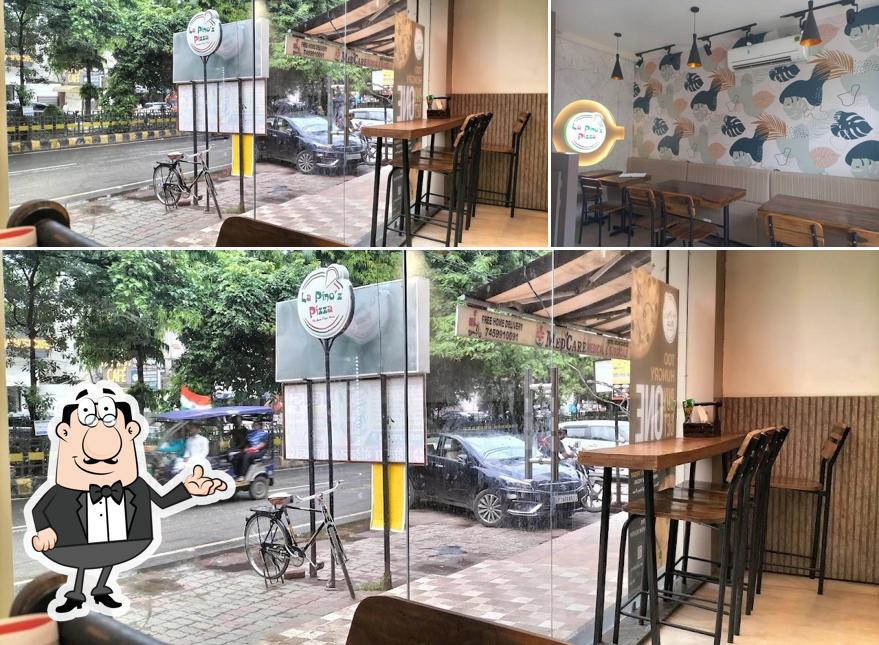 Take a seat at one of the tables at La Pino'z Pizza
