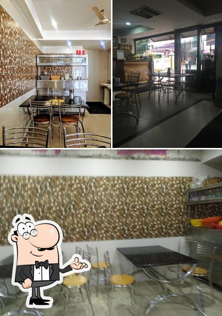 Take a seat at one of the tables at Hotel Anandaas