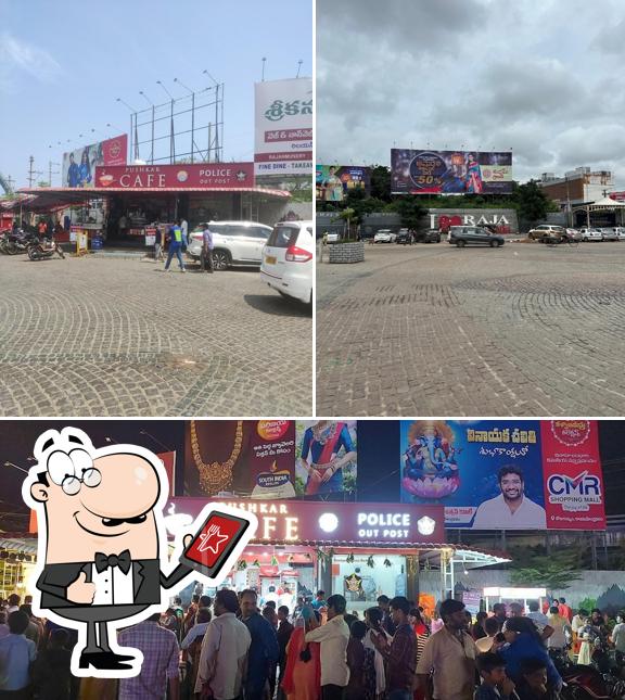 The photo of Pushkar Cafe’s exterior and food