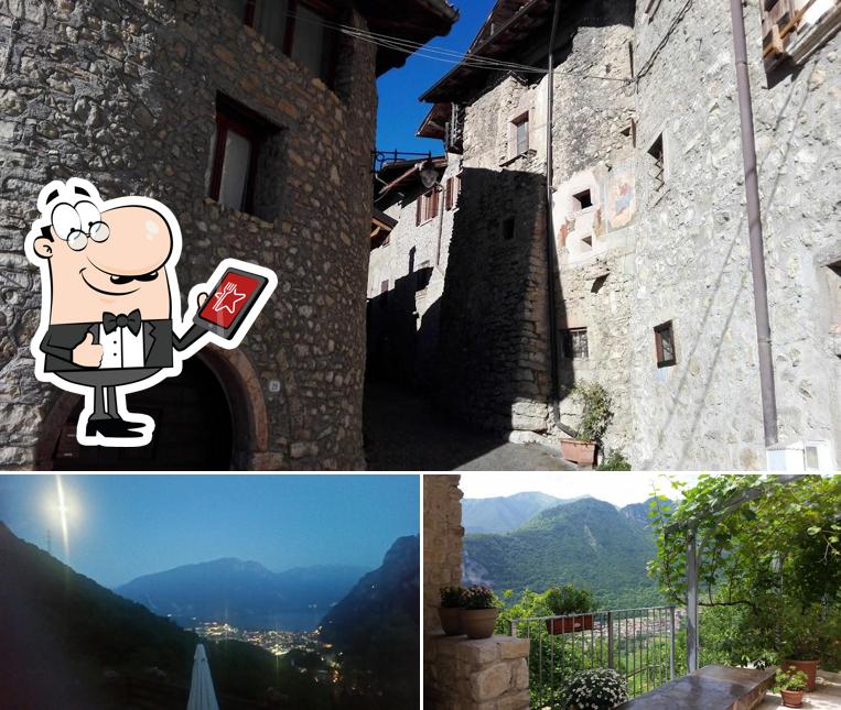 Puoi goderti l'aria fresca da seduto all'esterno di Agritur Calvola