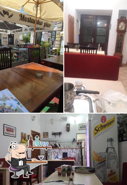 Installez-vous à l'une des tables de Crveni Han
