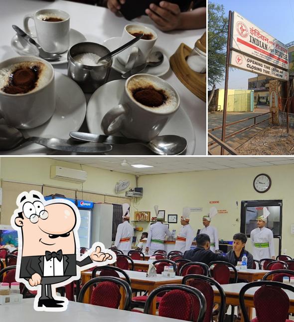 Take a seat at one of the tables at Indian Coffee House