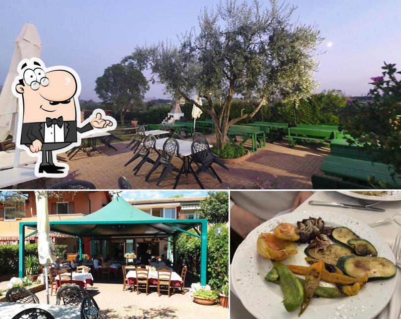 Dai un'occhiata agli interni di Al Parol Ristorante Pizzeria
