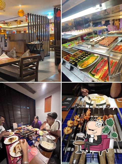 Take a seat at one of the tables at Barbeque Nation - Mangalore - Makmall