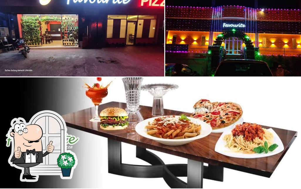 Check out the photo showing exterior and interior at Favourite Pizza