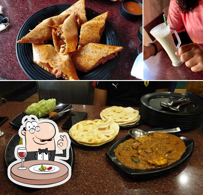 Navratna Udupi Pure Veg Family Restaurant is distinguished by food and beverage