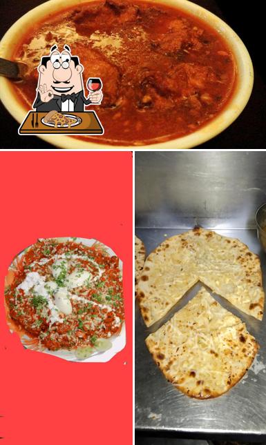 Get pizza at Prithi Kitchen & Bar