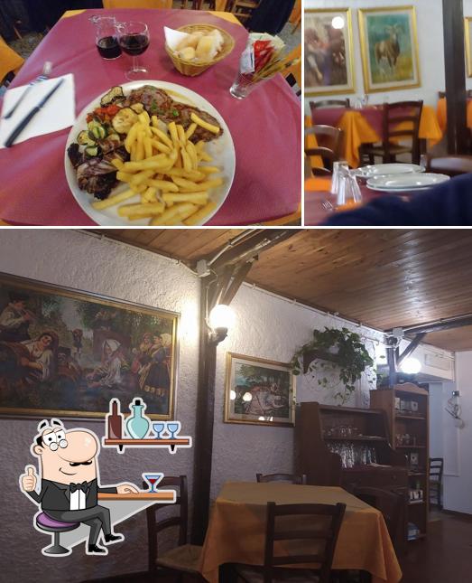 La foto della interni e tavolo da pranzo di Il Muflone