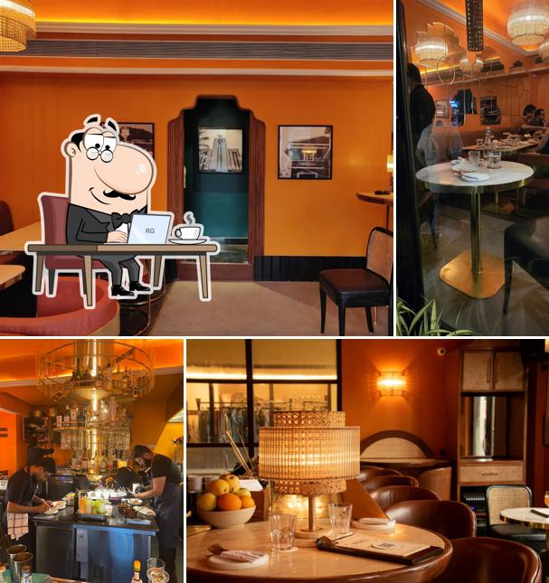 Take a seat at one of the tables at Miguel's - Cocktails & Petiscos