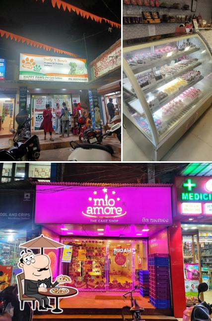 Check out the picture showing exterior and food at Mio Amore