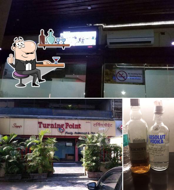 This is the photo displaying interior and alcohol at Turning Point