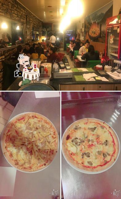 Questa è la foto che presenta la cibo e interni di bella pizza kebap