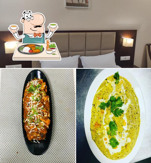 This is the picture displaying food and interior at Hotel Utsav Banswara