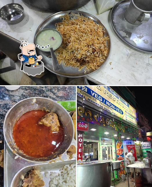 Check out the photo depicting food and interior at Sanman Hotel
