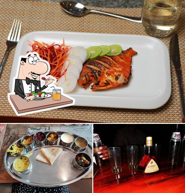 The photo of food and alcohol at Mareena Tourist Home