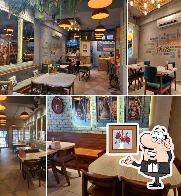 Take a seat at one of the tables at Caldo's Cafe & Multi-Cuisine Restaurant