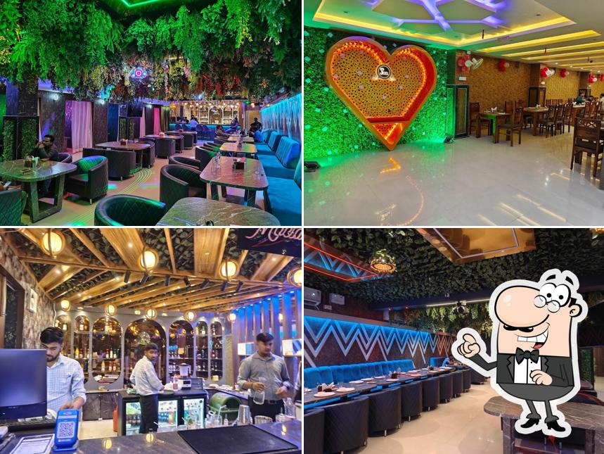 Take a seat at one of the tables at Jannat bar and restaurant