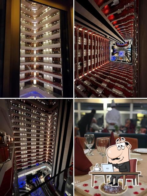 Take a seat at one of the tables at Le Belvedere - Le Meridien
