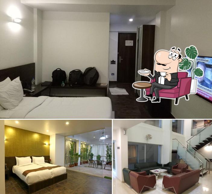 Take a seat at one of the tables at HOTEL SILVER LEAF