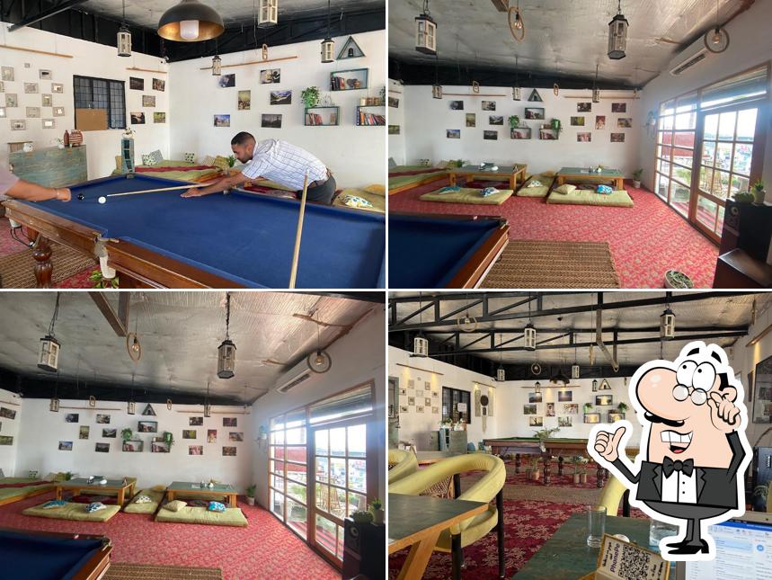 Take a seat at one of the tables at The Art Cafe