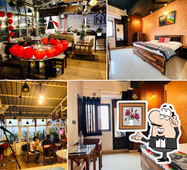 Take a seat at one of the tables at Nomads House: Bunkstay Hotel and Cafe