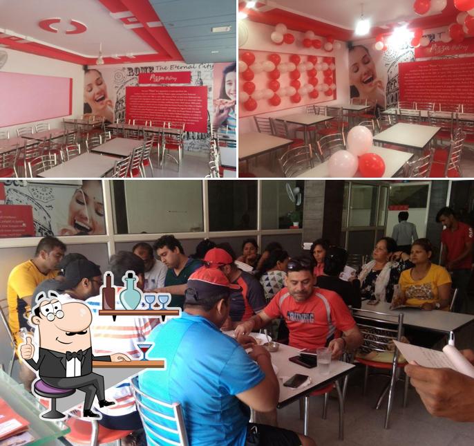 The interior of Laziz Pizza Garhwal And Restaurant