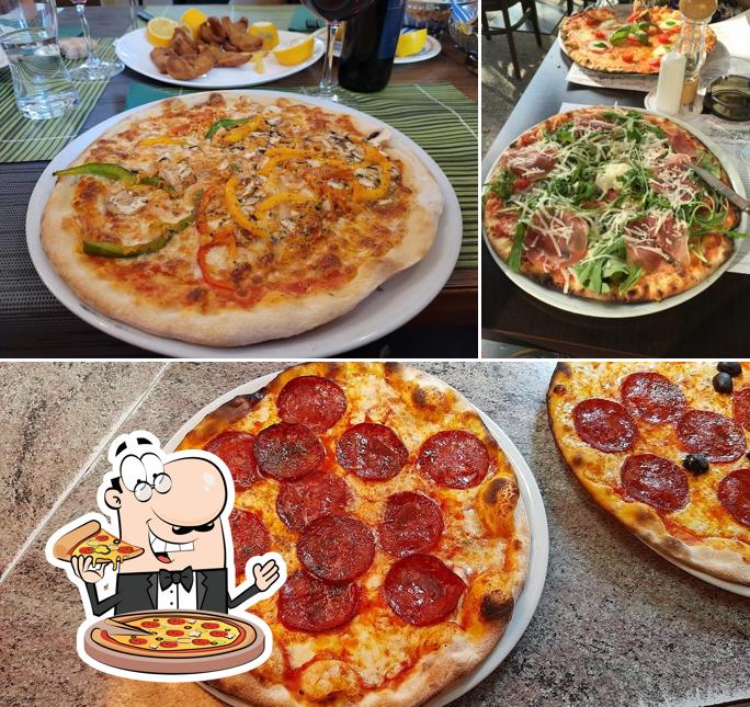 Scegli una pizza a Restaurant Pizzeria Schlüssel
