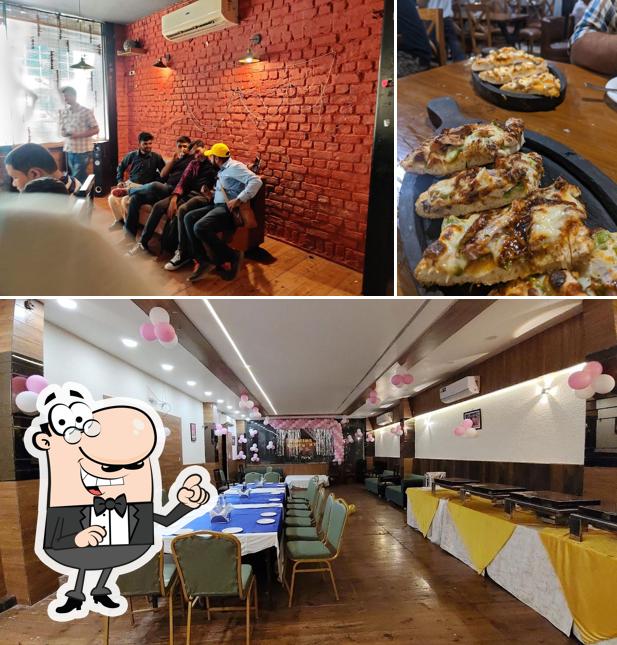 Take a seat at one of the tables at Hang Out
