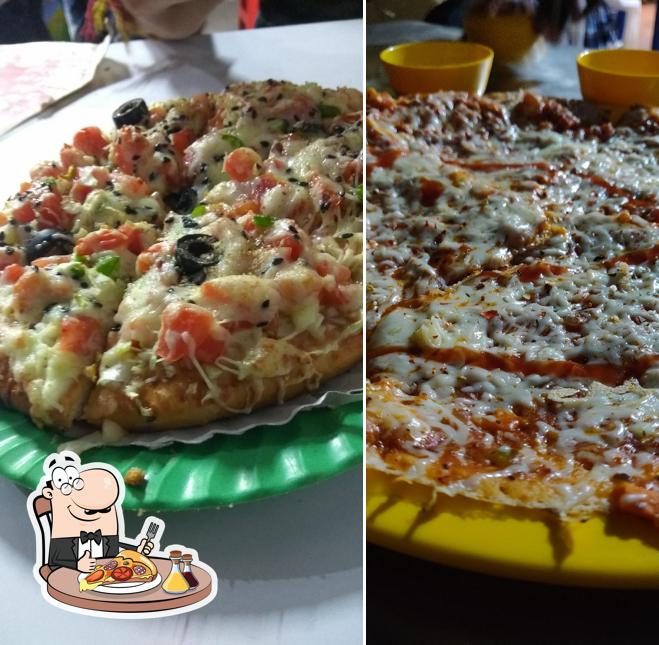 Pick pizza at MADRAS CAFE