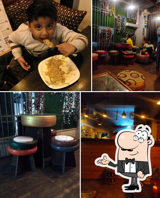 Take a seat at one of the tables at Chai Bar