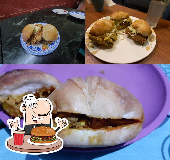 Order a burger at Teixeira's Fast Food