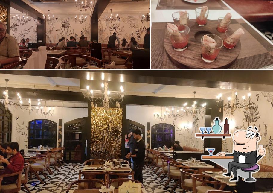 Take a seat at one of the tables at Charcoal Fine Dining