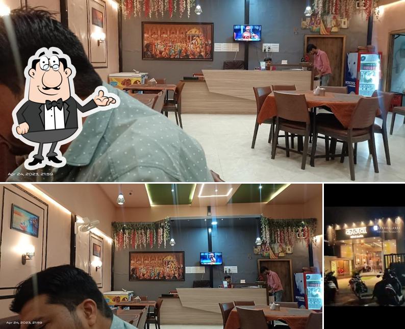 Check out the picture displaying interior and exterior at Kajwa Family Restaurant