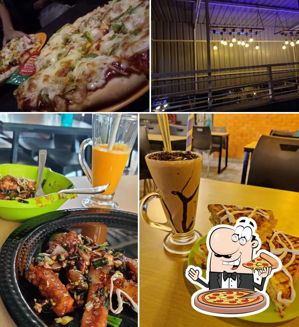 Order pizza at On Tunes Cafe