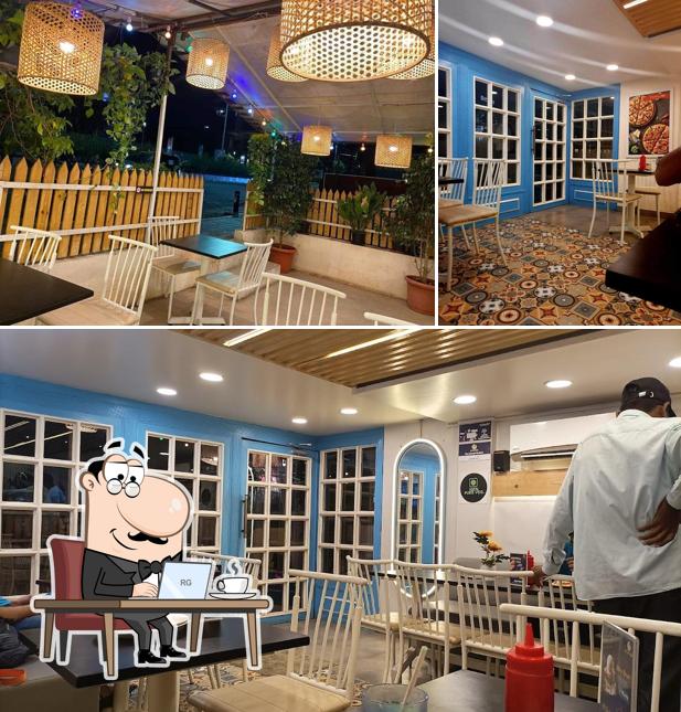 The interior of The Pizza Box & Cafe Senapati Bapat Road