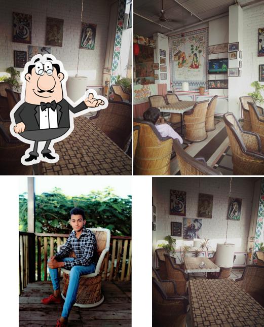 Take a seat at one of the tables at Radhe Ji Restauraunt