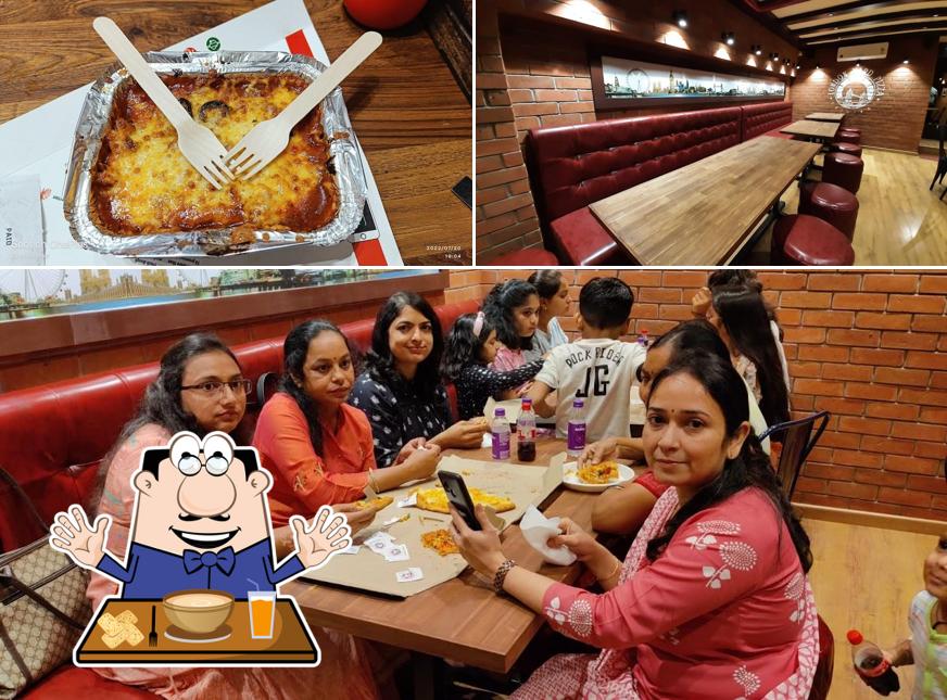 This is the image displaying food and interior at London Yard Pizza
