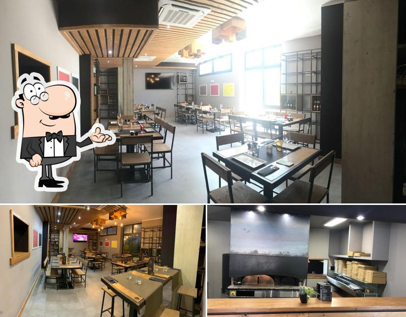 Dai un'occhiata agli interni di Pizzeria Lo Spizzico