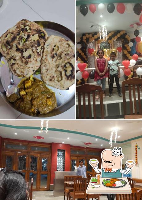 Take a look at the photo depicting food and interior at Madhuvan Pure Veg restaurant