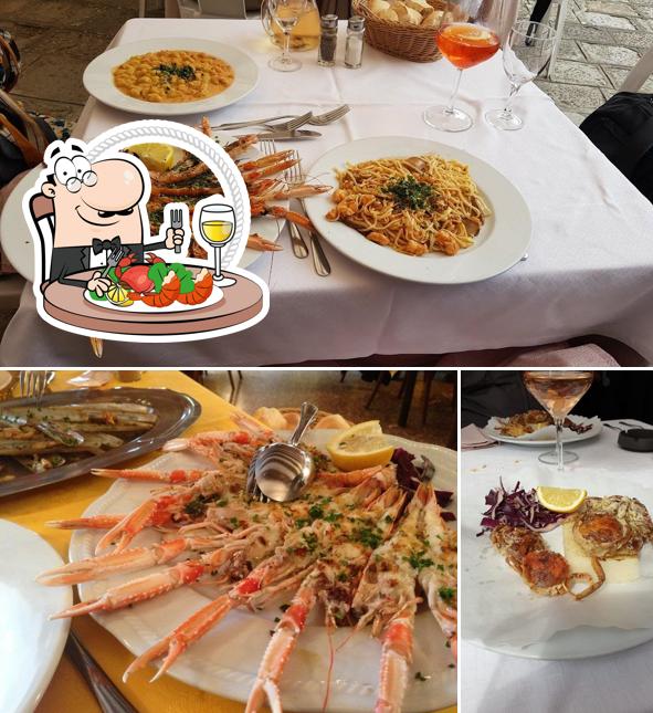 Ordina la cucina di mare a Trattoria Busa alla Torre