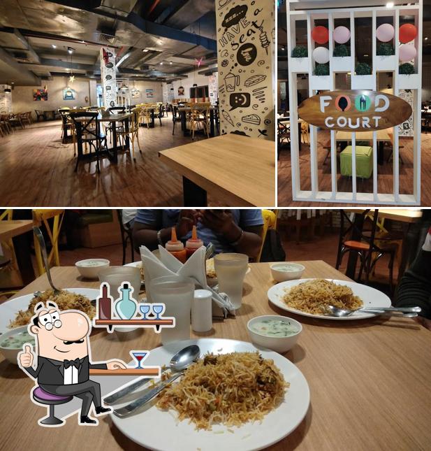 Take a seat at one of the tables at Big bazar Food court