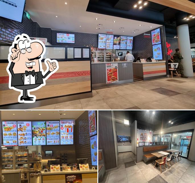Siediti a un tavolo di Kentucky Fried Chicken