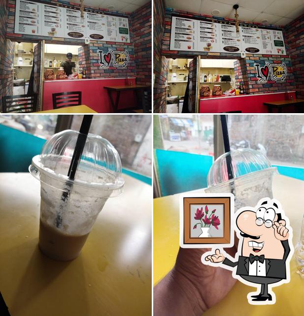 The image of PIZZA CORNER’s interior and food