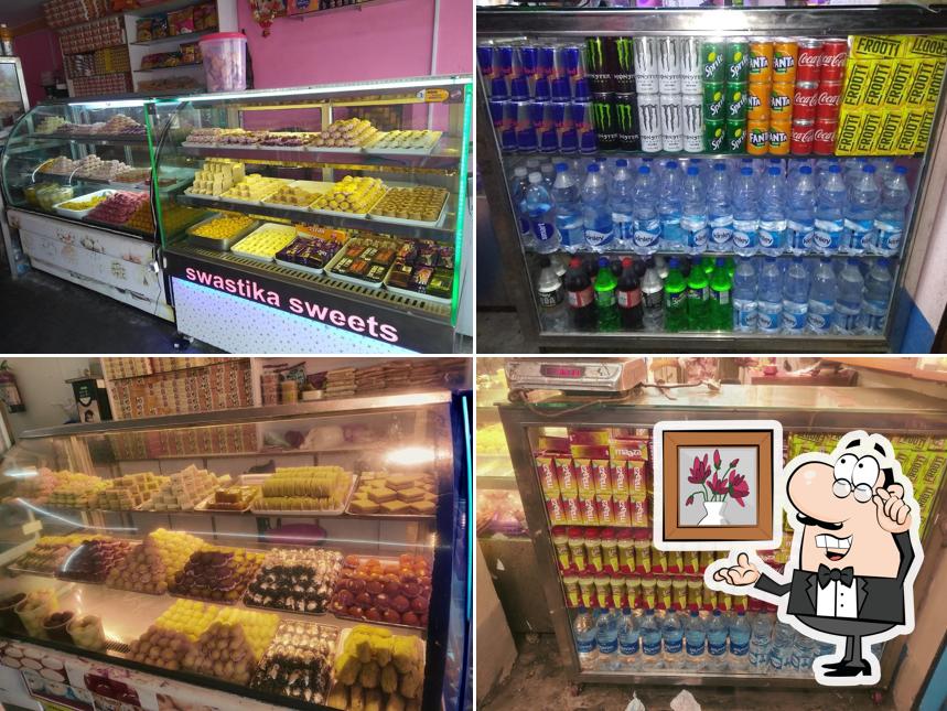 Take a seat at one of the tables at Swastika Sweets Snacks